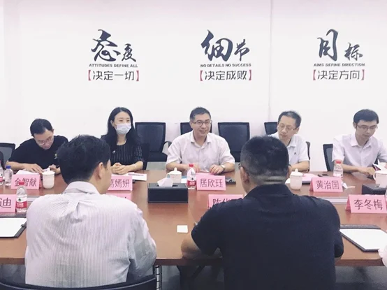 Shanghai economic commission's Ju Xinjue leads a delegation to Sunwise — original image